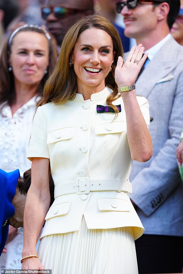 The Princess of Wales waves to the crowd as she was greeted by a huge standing ovation