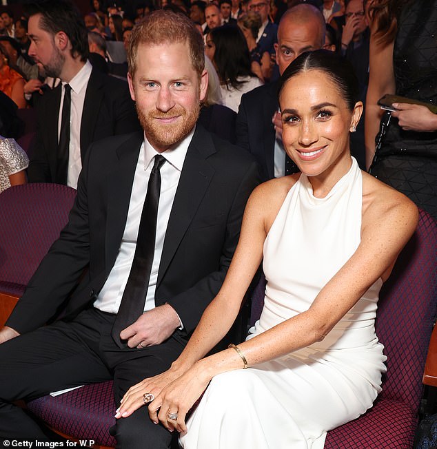 Princess Delphine of Belgium has said she feels 'very sorry' for the Duke of Sussex (pictured with Meghan in California last year)
