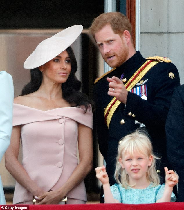 Prince Harry was caught 'mansplaining' what a flypast is to Meghan Markle during their first Trooping The Colour after getting married, as a lip reader detailed the awkward interaction in a new documentary. The Sussexes are seen alongside Isla Phillips, Princess Anne's granddaughter, as seen in 2018