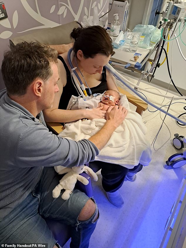 Liliwen Iris Thomas with her parents Emily Brazier and Rhodri Thomas, who have launched a civil action against Cardiff and Vale University Health Board after Liliwen died from perinatal asphyxia – a lack of oxygen