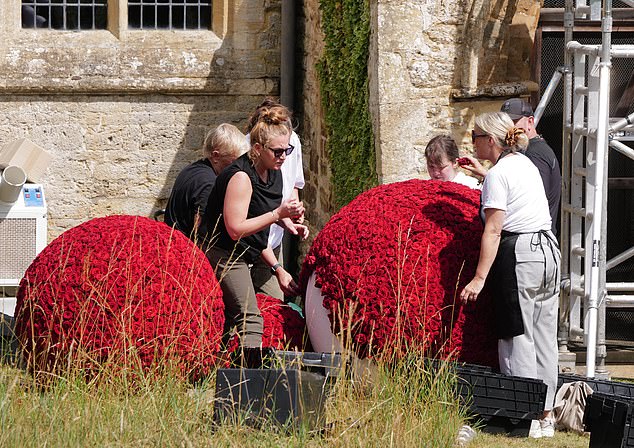 Last minute preparation for the society wedding of the year were underway in the Cotswolds today