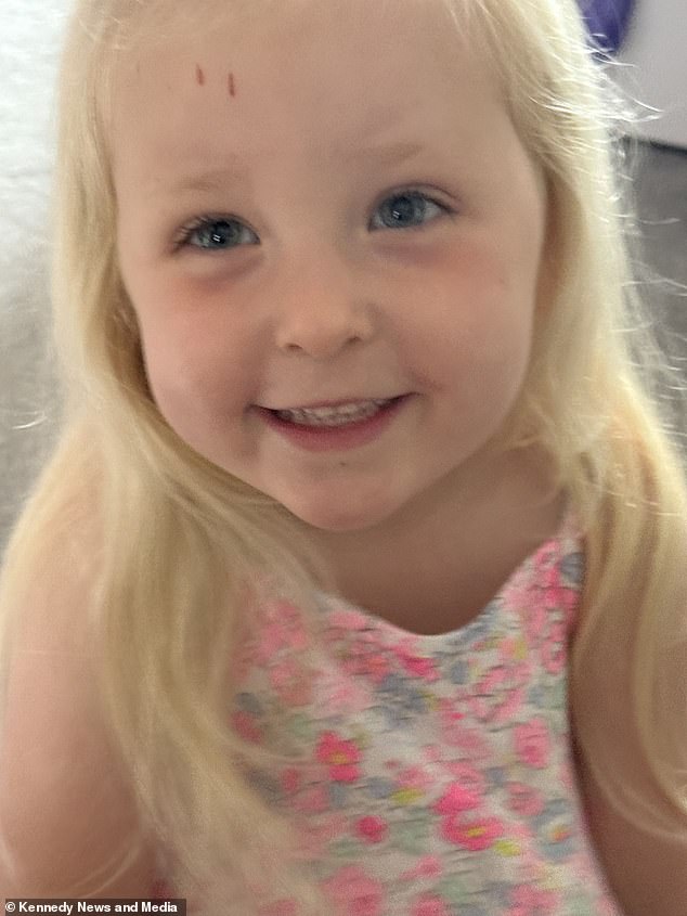 Natasha Robinson from Cheshire was shocked to find a snake inside her home, while her daughter Primrose (pictured) obliviously played next to it