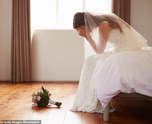 A bride-to-be revealed on Reddit her 'oddly competitive' mother plans to wear a white, floor-length gown to her wedding-claiming it's her 'last chance' to feel beautiful (stock image)