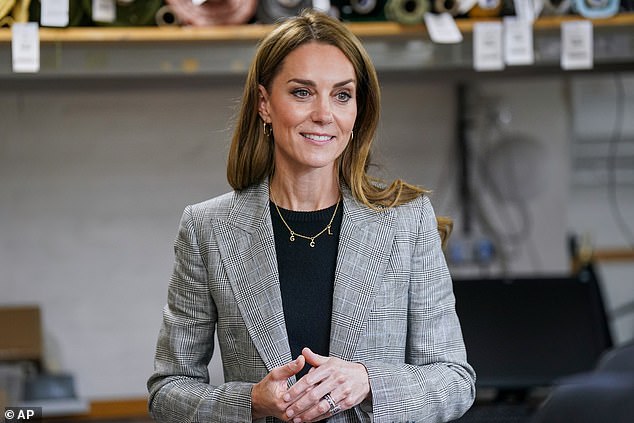 Stepping out in Sudbury Mills in Suffolk earlier today, the Princess, 43, opted to wear an ‘Earl’ jacket, £845, and matching 'Schoolboy' trousers, £525, by Bella Freud, in a classic Prince of Wales check, teamed with a black Boden jumper and gold diamond cupid maxi hoop earrings, £2,450, by Daniella Draper