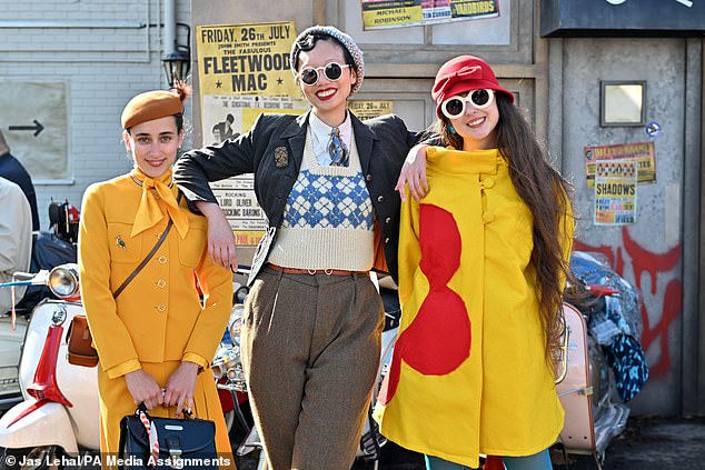 Pals who slay together! Three guests donned their vintage best at day-two of the Goodwood Revival at Chichester