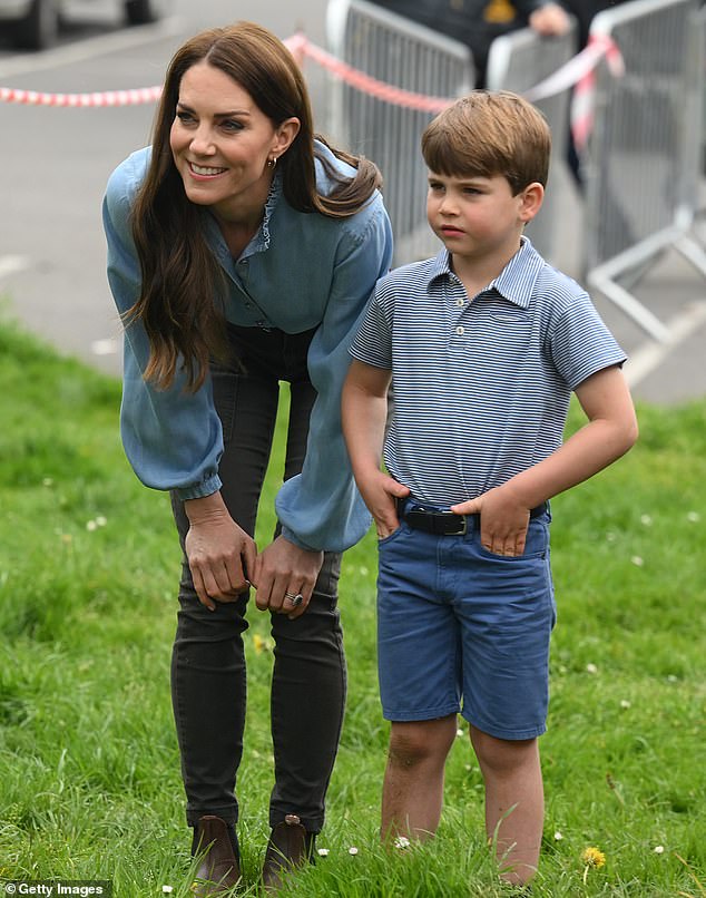 Kate Middleton said her youngest son Prince Louis is currently obsessed with collecting conkers and hiding them in 'his cupboard' and 'in his bed' (pictured in Slough in May 2023)