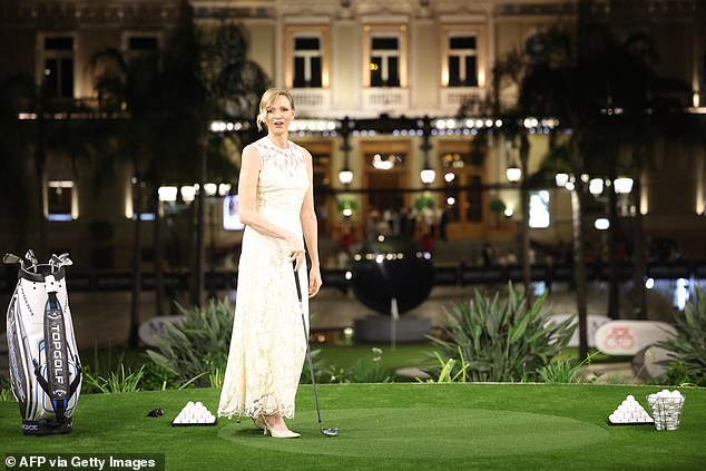 Princess Charlene of Monaco (pictured) donned a beautiful white gown as she attended a charity golf tournament in Monte Carlo