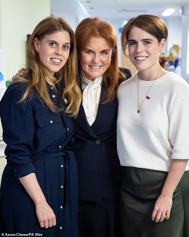 Royal experts have revealed what might happen to Princess Beatrice and Eugenie after Fergie's leaked email. Pictured together on a visit to the Teenage Cancer Trust in April