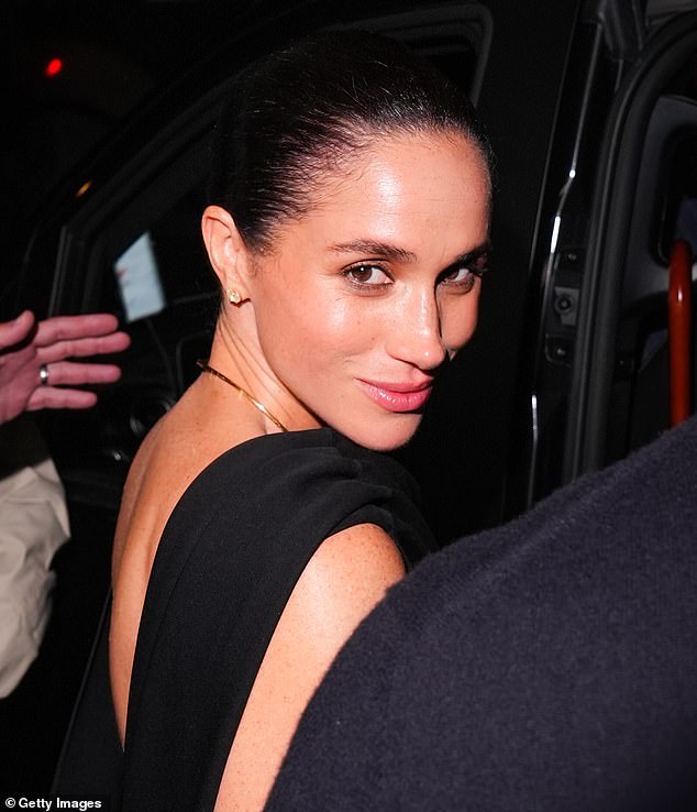 The Duchess of Sussex's makeup artist, Daniel Martin, has revealed how he created Meghan's 'juicy and glowy' Paris Fashion Week look (pictured)