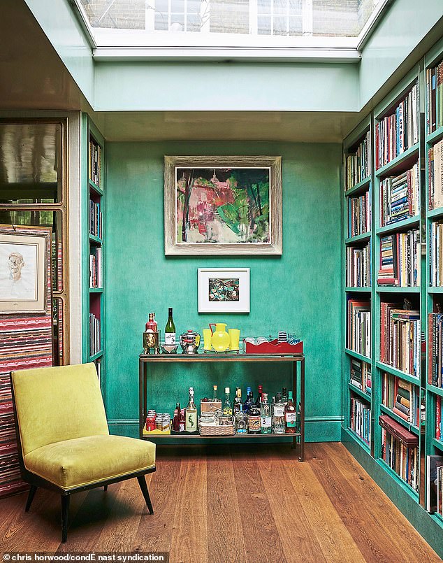 The statement wall and all-important drinks table in the entranceway of Nina’s Chelsea home