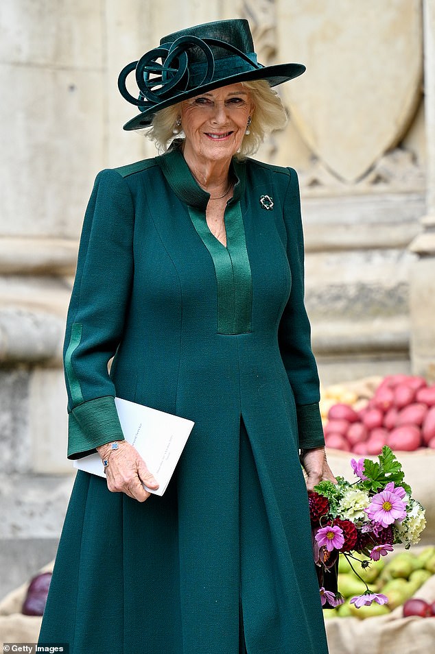 Queen Camilla wore a stylish forest green ensemble today as she arrived at Westminster Abbey to attend the National Harvest Festival Service