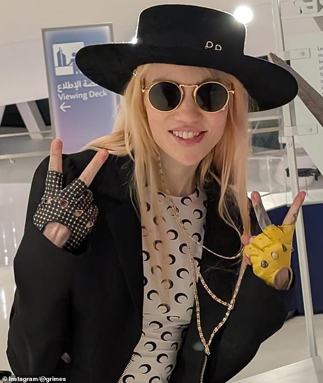 Grimes has ignited a response over the inclusion of Charlie Kirk on her new album art