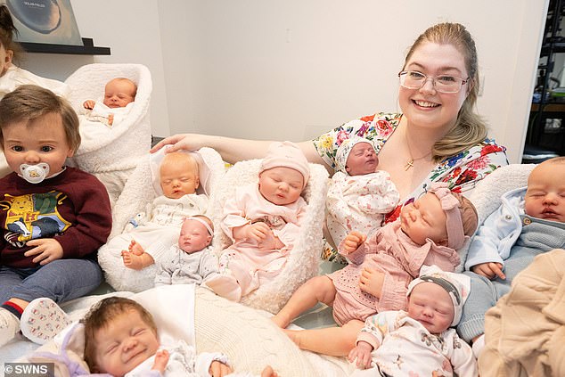 Jess Ellis, 29, from Newham, London, says she practises parenting with her 15-strong collection of reborn dolls; she first became interested in the lifelike hand-painted dolls in 2020 after a battle with Polycystic Ovary Syndrome (PCOS)